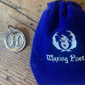 Waxing Poetic Sterling Round Insignia “H” Charm Retired